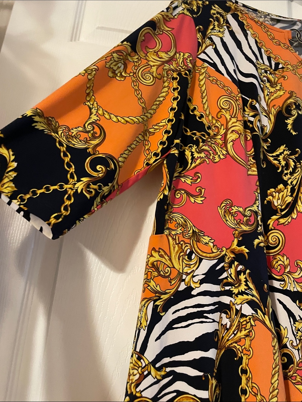 Susan Graver Orange & Black Chain-Print V-Neck Top - Picture 3 of 8